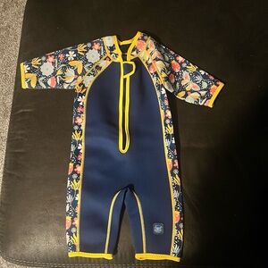 Kids short Sleeve Navy Floral “splash about” One-Piece Swimsuit - Yellow Trim